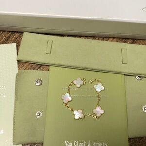 Elegant Gold Bracelet with White clover charms